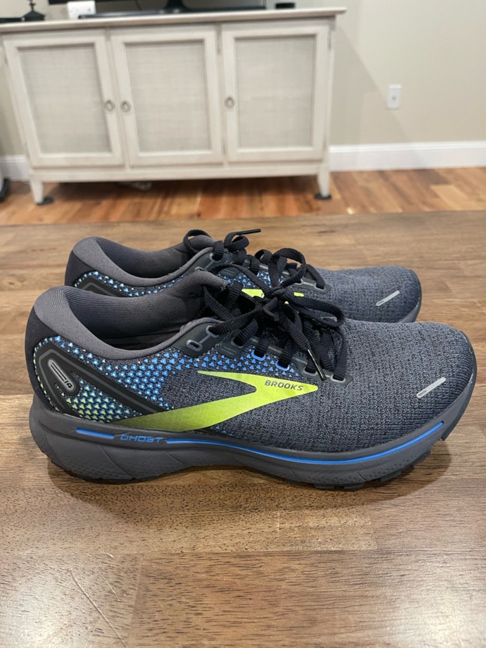 Brooks gray running shoes with blue and lime accents